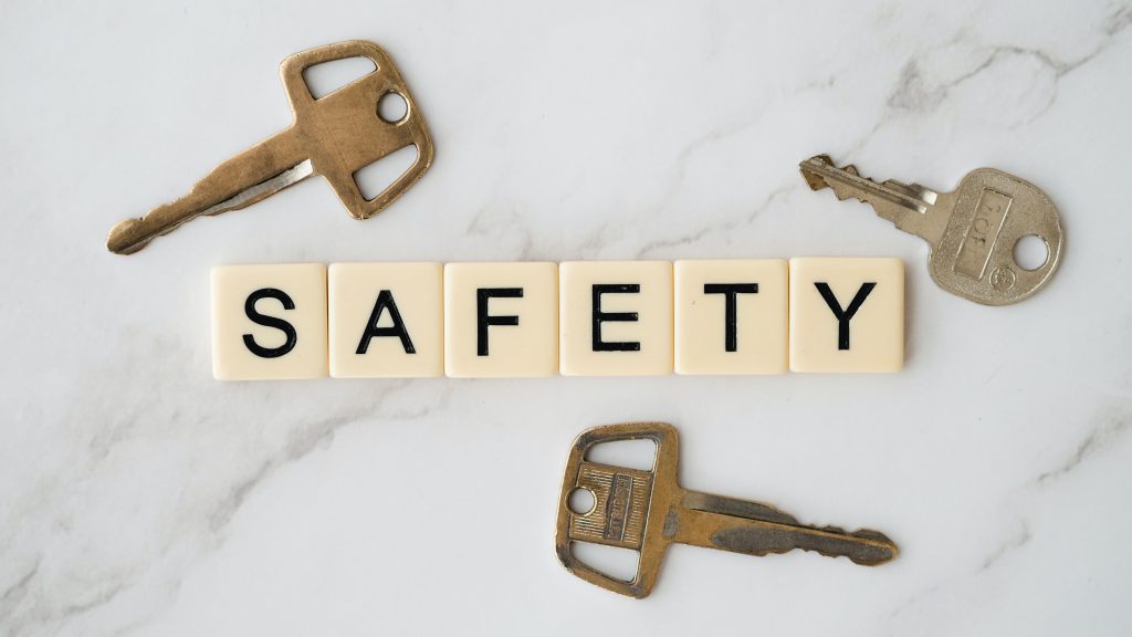Safety spelled out with Scrabble tiles, with keys arranged around the letters.